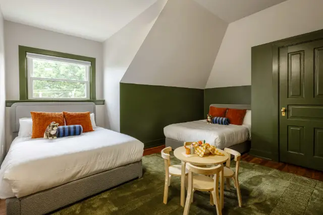 Bedroom 4: two double beds, kids' play table and toys, on 3rd floor