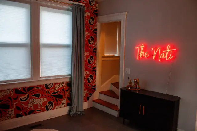 Instagram-worthy corner with bold design and a neon local touch—perfect for photos, pre-night-out moments, or just soaking…