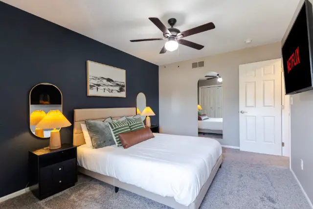 Bedroom 3: Queen bed, includes full closet w/ shelves and TV