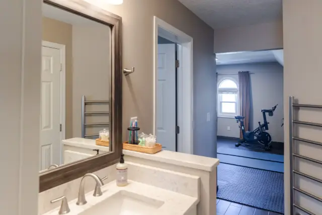 Ensuite bathroom is outfitted with a Scandinavian towel warmer for those cold winter mornings.
